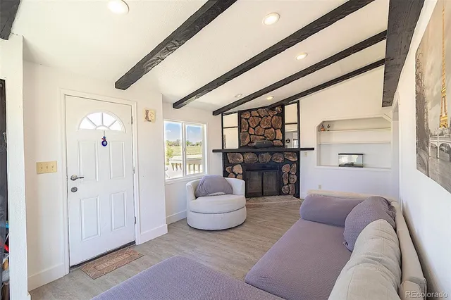 a view of livingroom with furniture and wooden floor