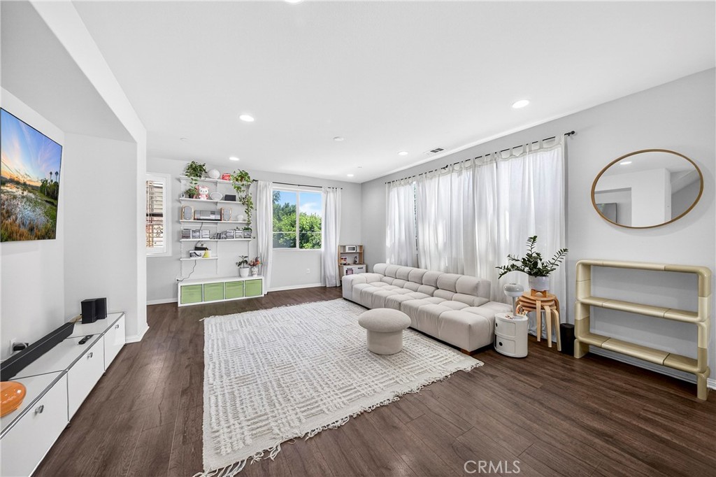 1021 Mandarin Place Fullerton, CA 92833 - Photo 1 of 1 a living room with furniture and a large window