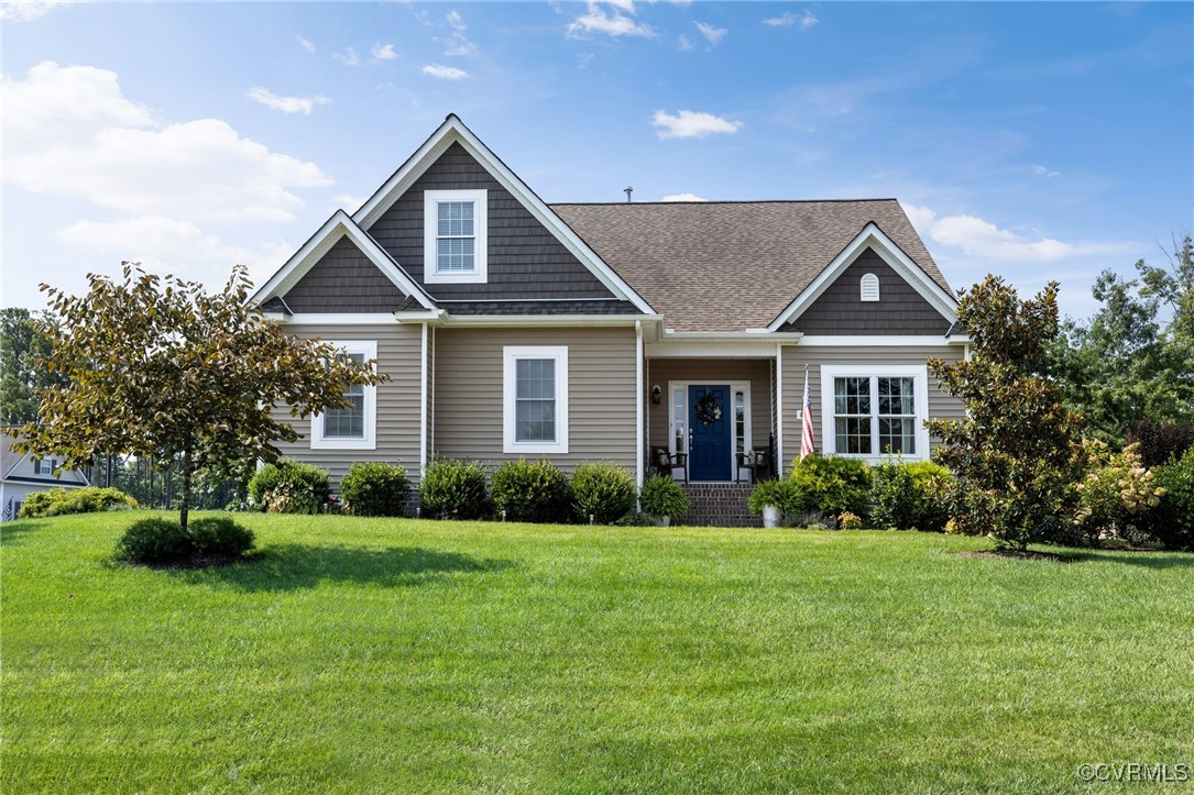 11200 Avening Road Midlothian, VA 23112 - Photo 1 of 35 a front view of a house with a yard