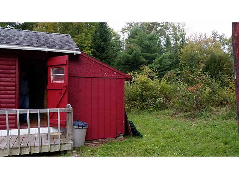 4 Burrill Road Carroll Plt, ME 04487 - Photo 17 of 26 Exterior Back. the pond is just on...