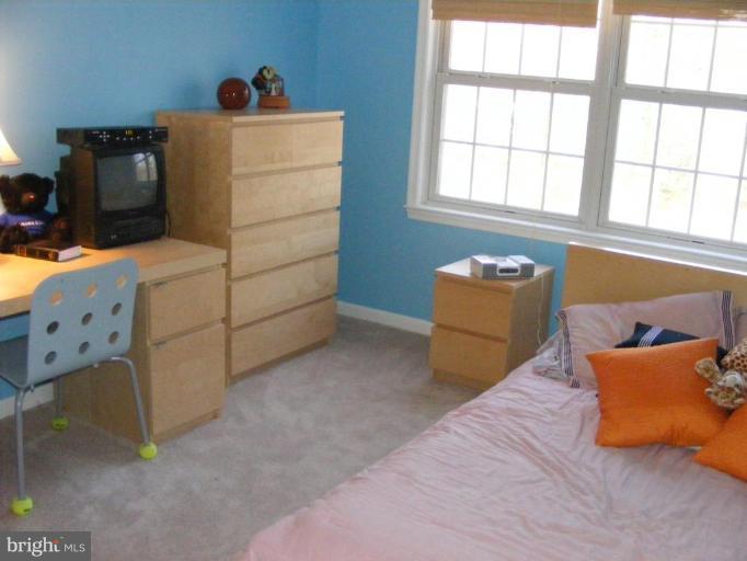 1219 Providence Road Towson, MD 21286 - Photo 17 of 27 a bedroom with a bed and window
