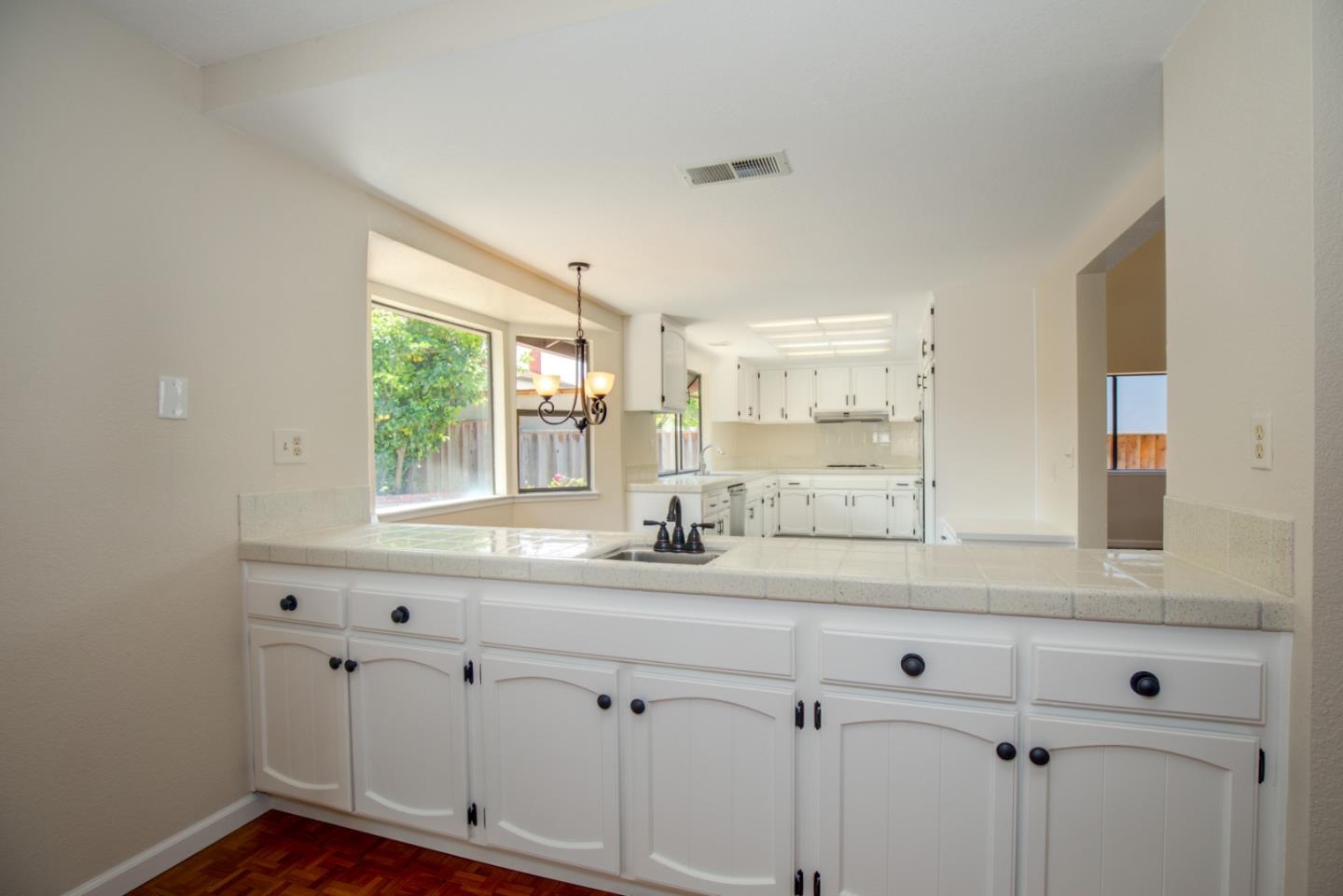 2774 Boncheff Drive San Jose, CA 95133 - Photo 17 of 38 a bathroom with a sink and a window