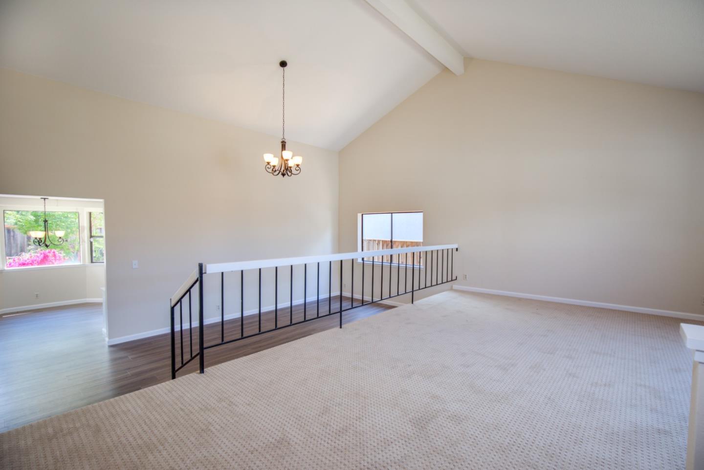 2774 Boncheff Drive San Jose, CA 95133 - Photo 5 of 38 a view of a hallway with window and stairs