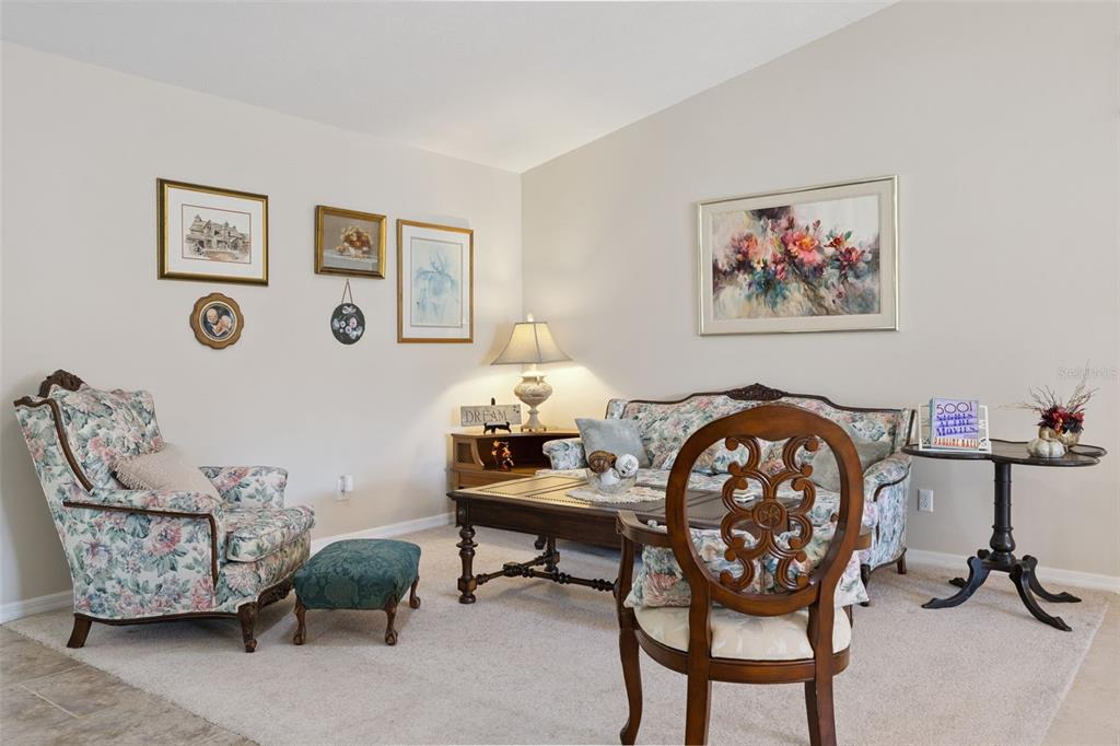 26600 Racquet Circle Leesburg, FL 34748 - Photo 17 of 80 a view of a workspace with furniture and a workspace