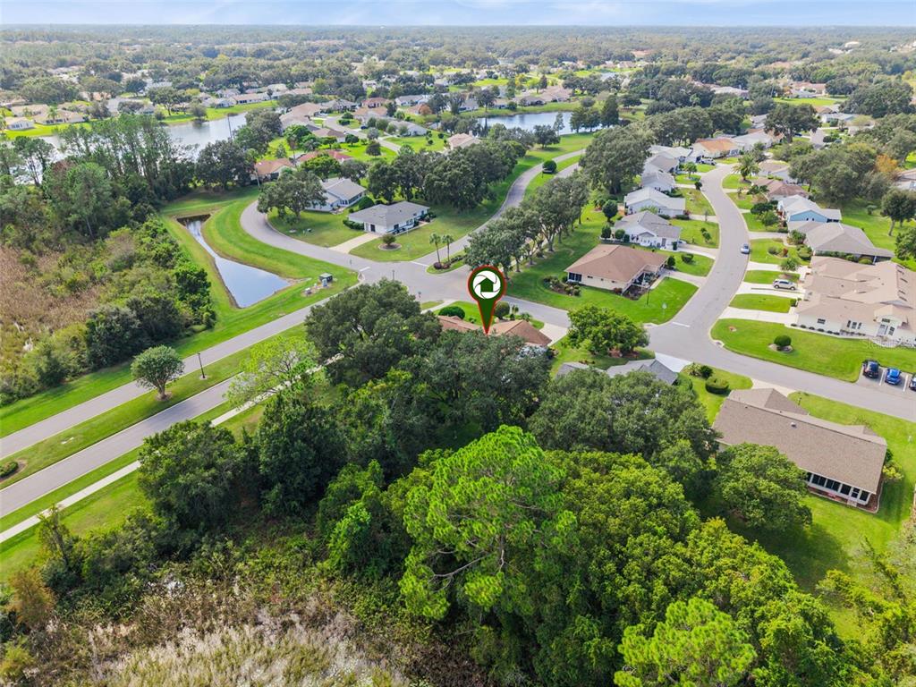 26600 Racquet Circle Leesburg, FL 34748 - Photo 37 of 80 an aerial view of multiple house