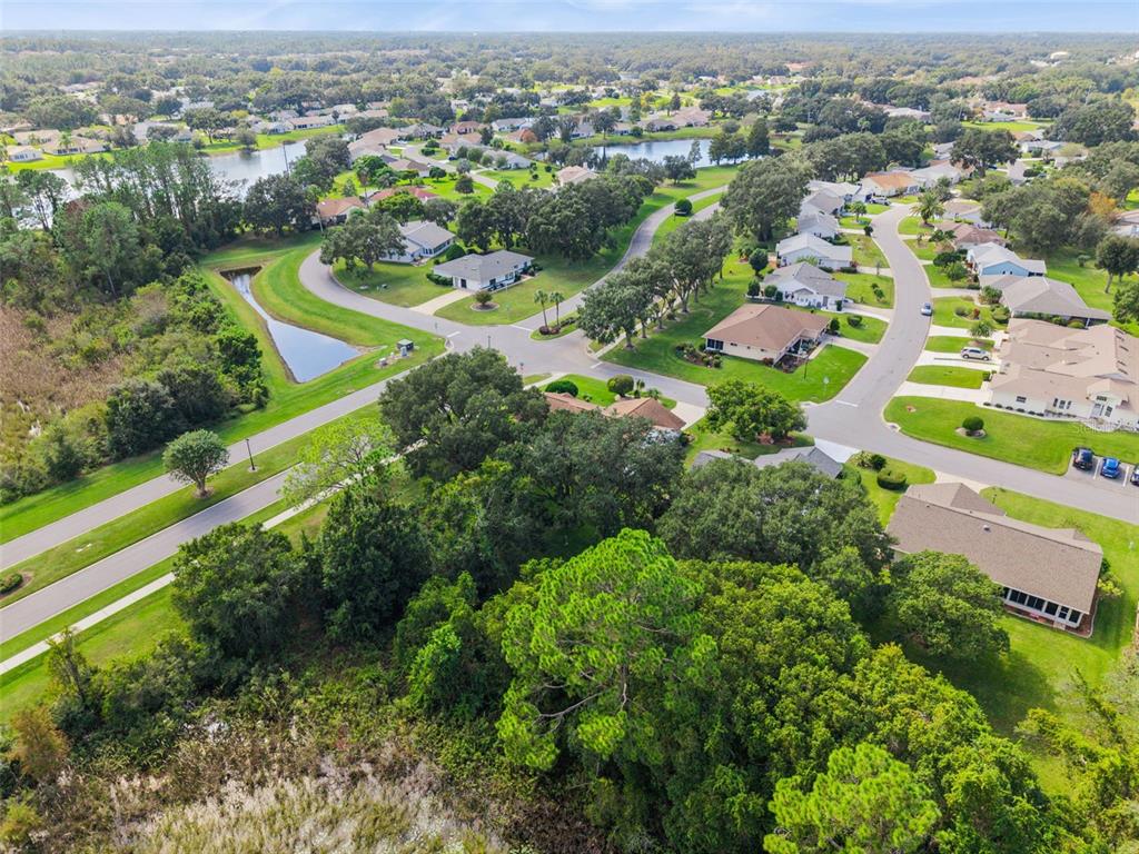 26600 Racquet Circle Leesburg, FL 34748 - Photo 38 of 80 an aerial view of multiple house