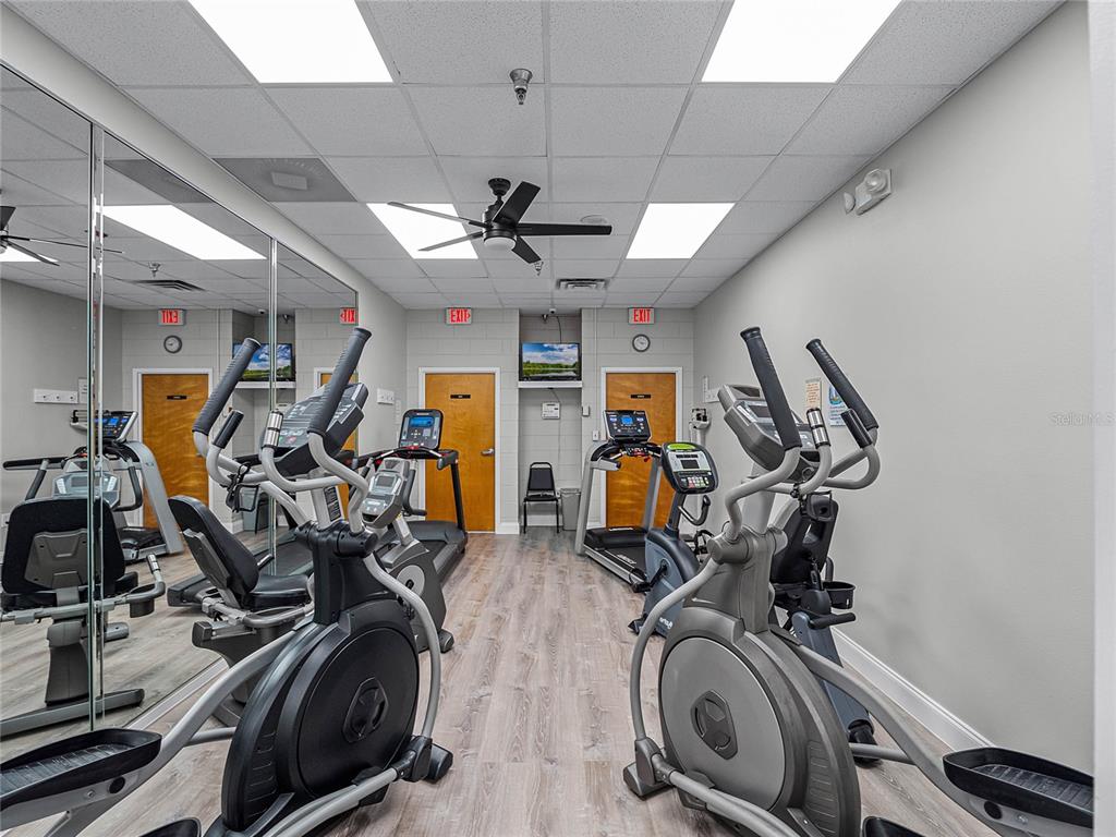 26600 Racquet Circle Leesburg, FL 34748 - Photo 45 of 80 a view of a room with gym equipment
