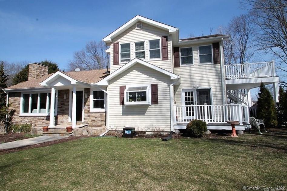 44 Tashua Road Trumbull, CT 06611 - Photo 1 of 1 a front view of a house with a yard