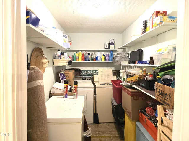 a room with storage and utility