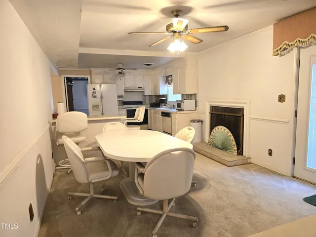 a view of a dining room with furniture