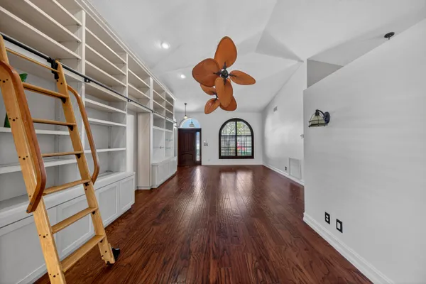 a view of entryway with wooden floor