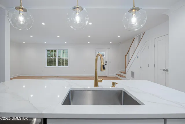 a view of kitchen with sink and dishwasher