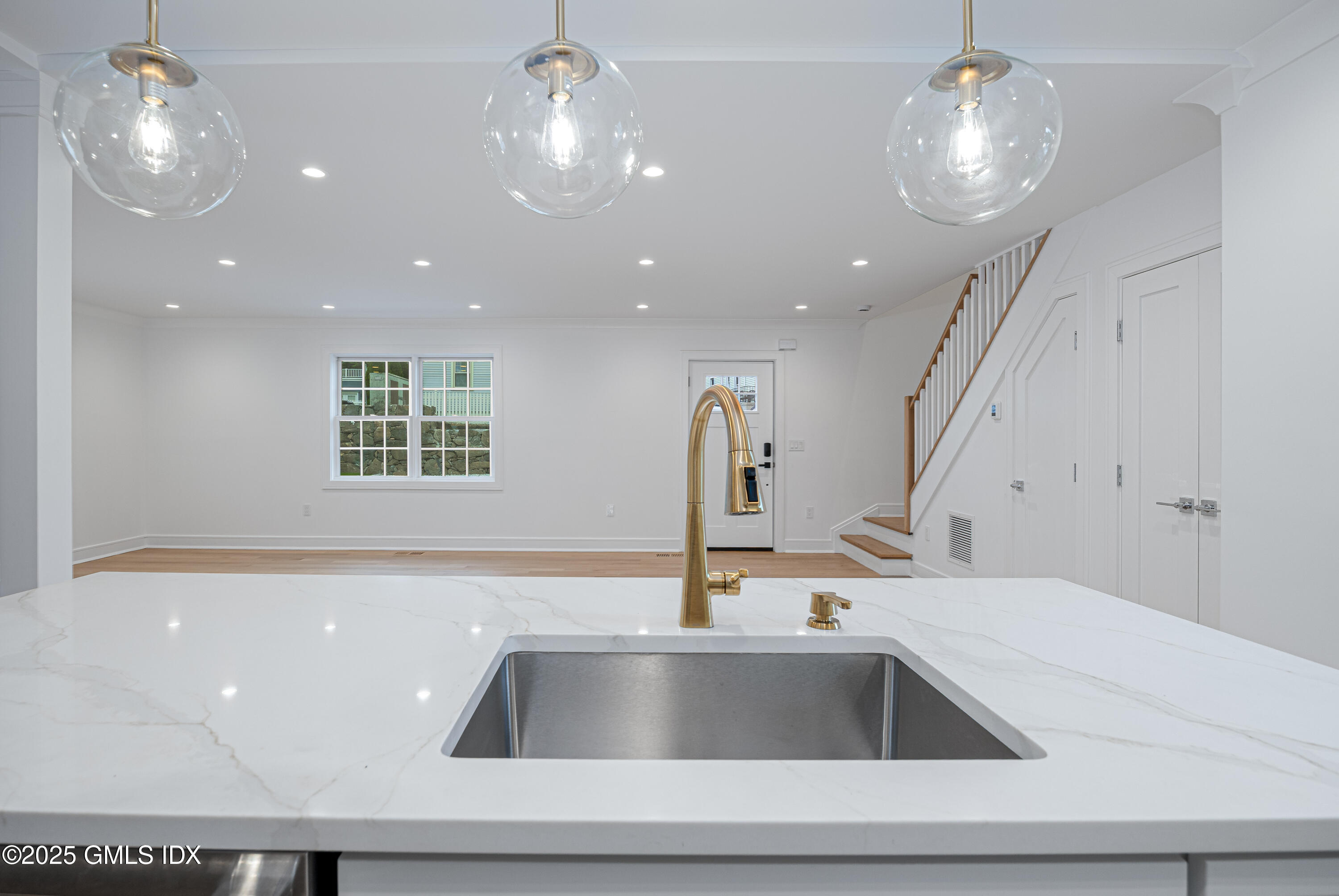 82 Josephine Evaristo Avenue Greenwich, CT 06830 - Photo 3 of 13 a view of kitchen with sink and dishwasher
