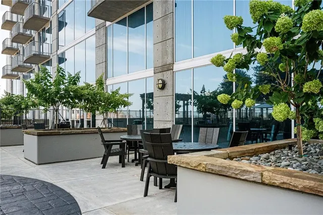 a view of a chairs and table in a patio