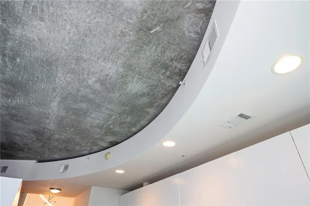 a view of a bathtub in a hallway