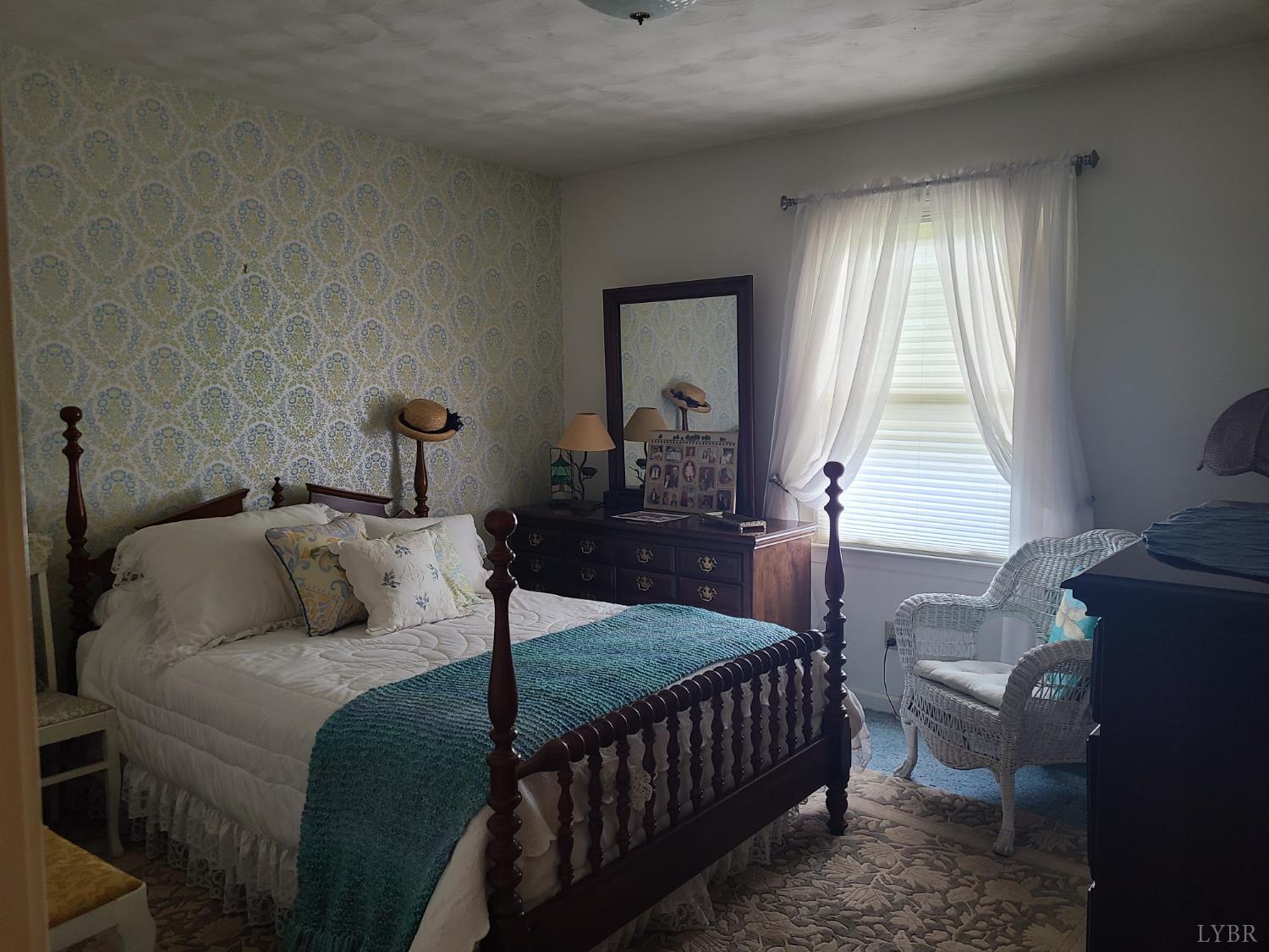 733 Morning Star Road Appomattox, VA 24522 - Photo 30 of 33 a bedroom with a bed and window