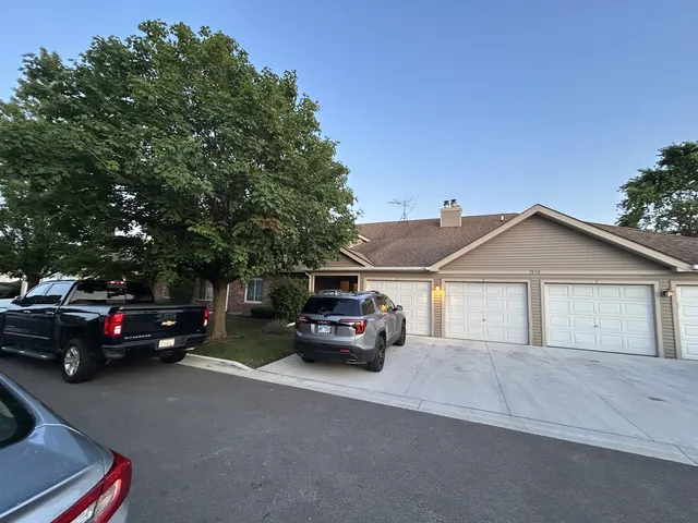 a view of street with parked cars