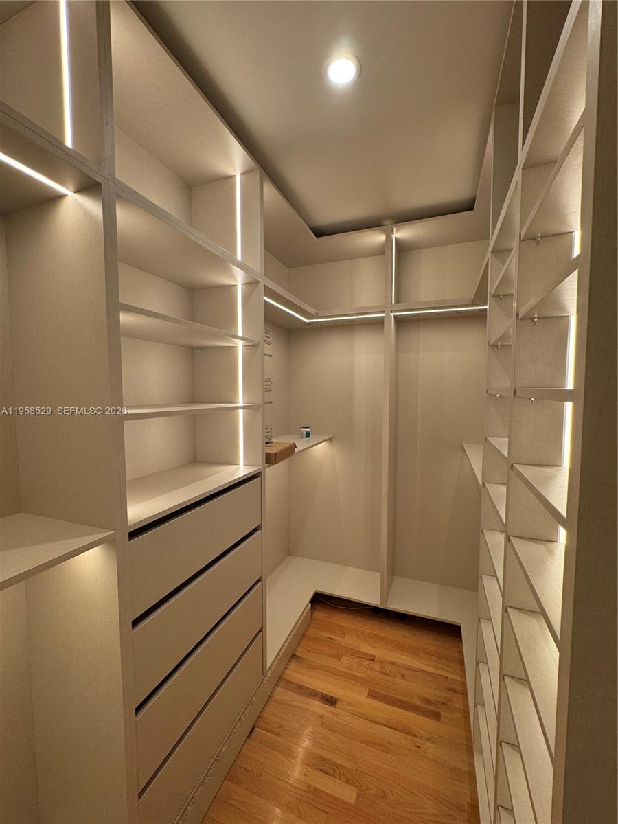 3185 Washington Street Miami, FL 33133 - Photo 11 of 48 a view of walk in closet
