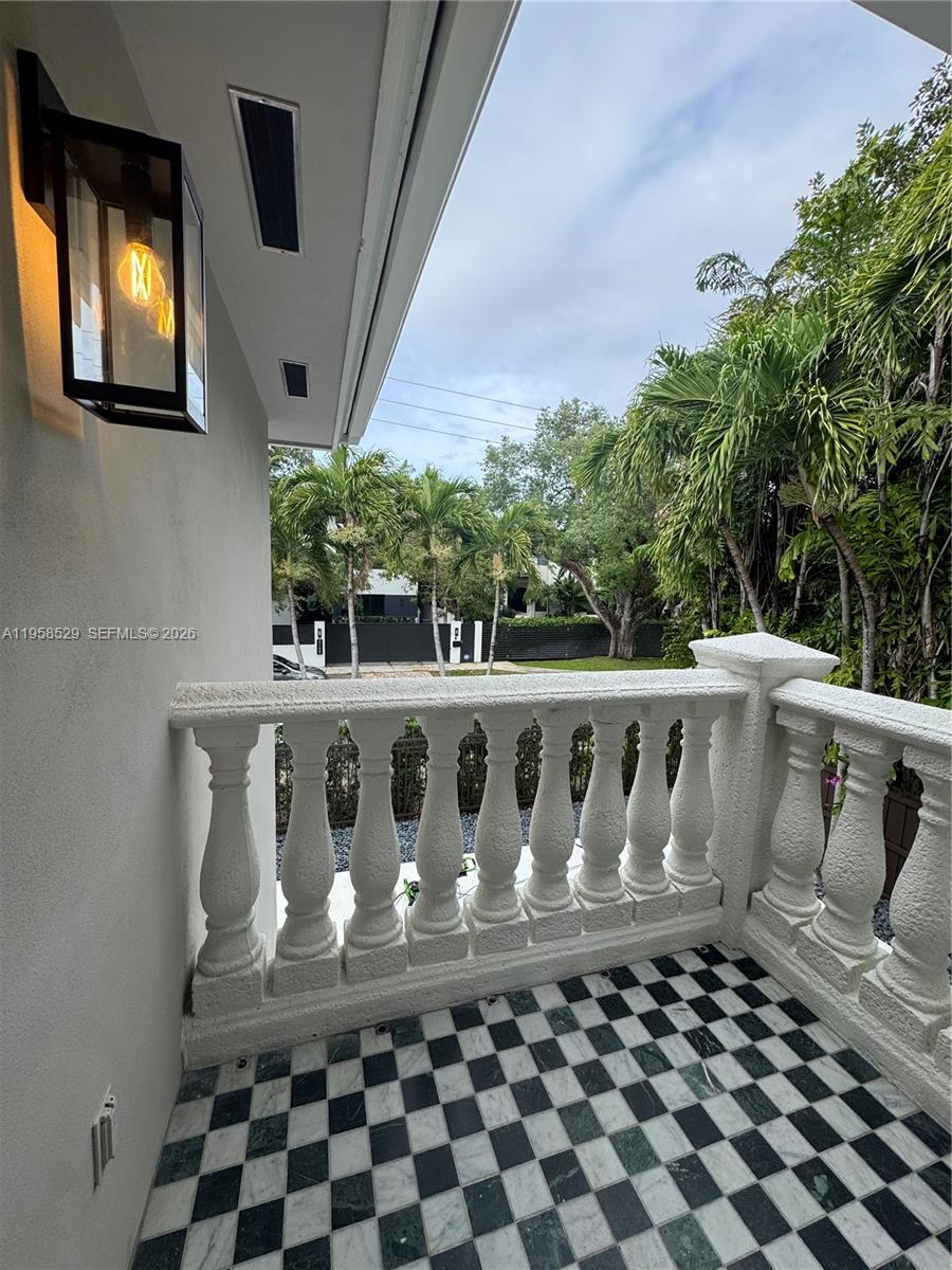 3185 Washington Street Miami, FL 33133 - Photo 15 of 48 a front view of a house with a window