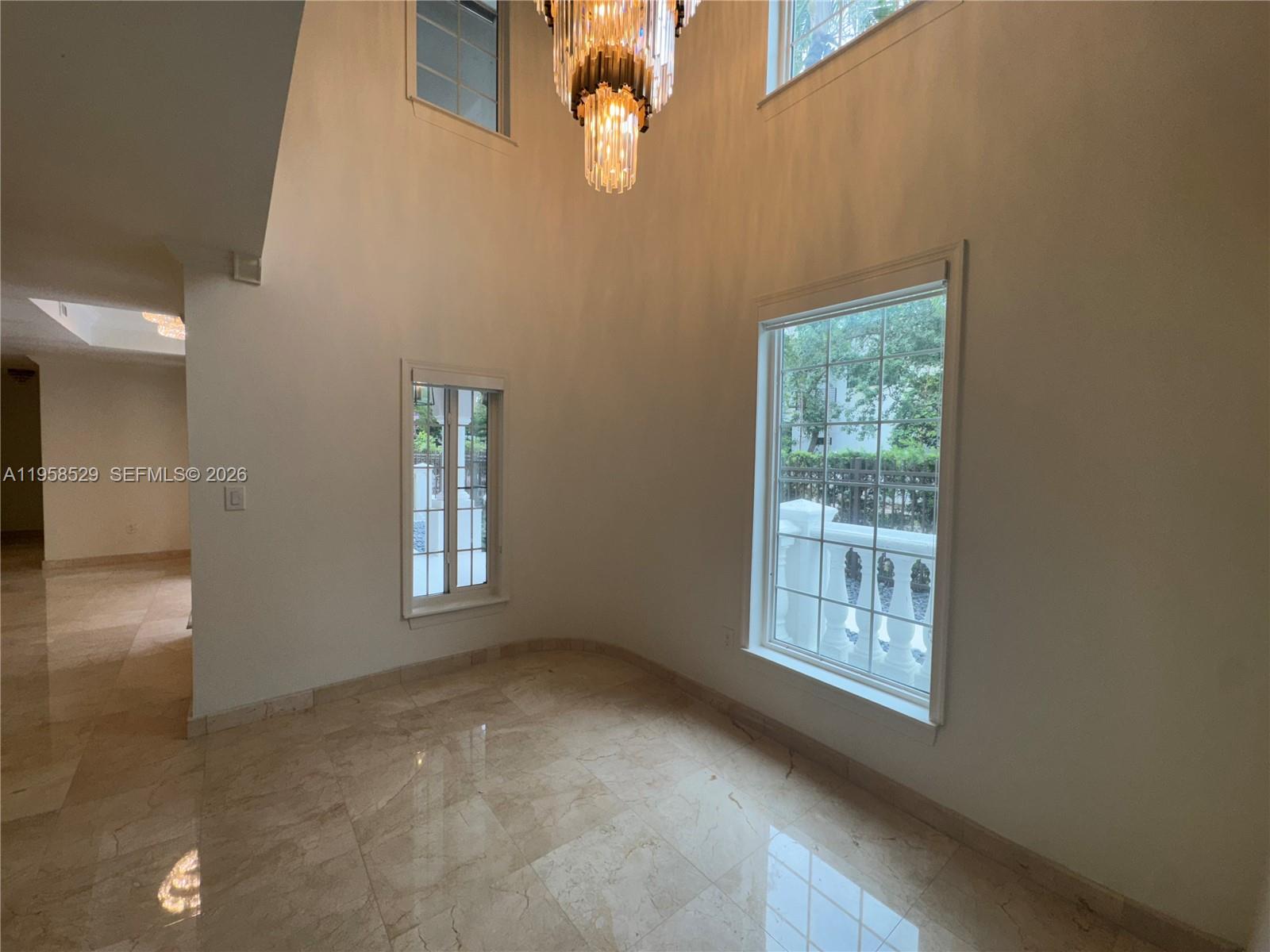 3185 Washington Street Miami, FL 33133 - Photo 17 of 48 a view of an empty room with a window