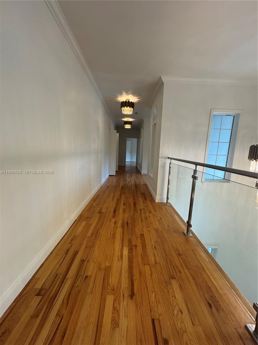 3185 Washington Street Miami, FL 33133 - Photo 25 of 48 a view of wooden floor in a room