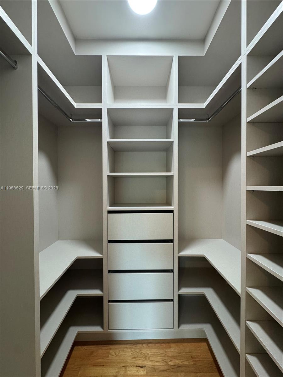 3185 Washington Street Miami, FL 33133 - Photo 28 of 48 a view of walk in closet
