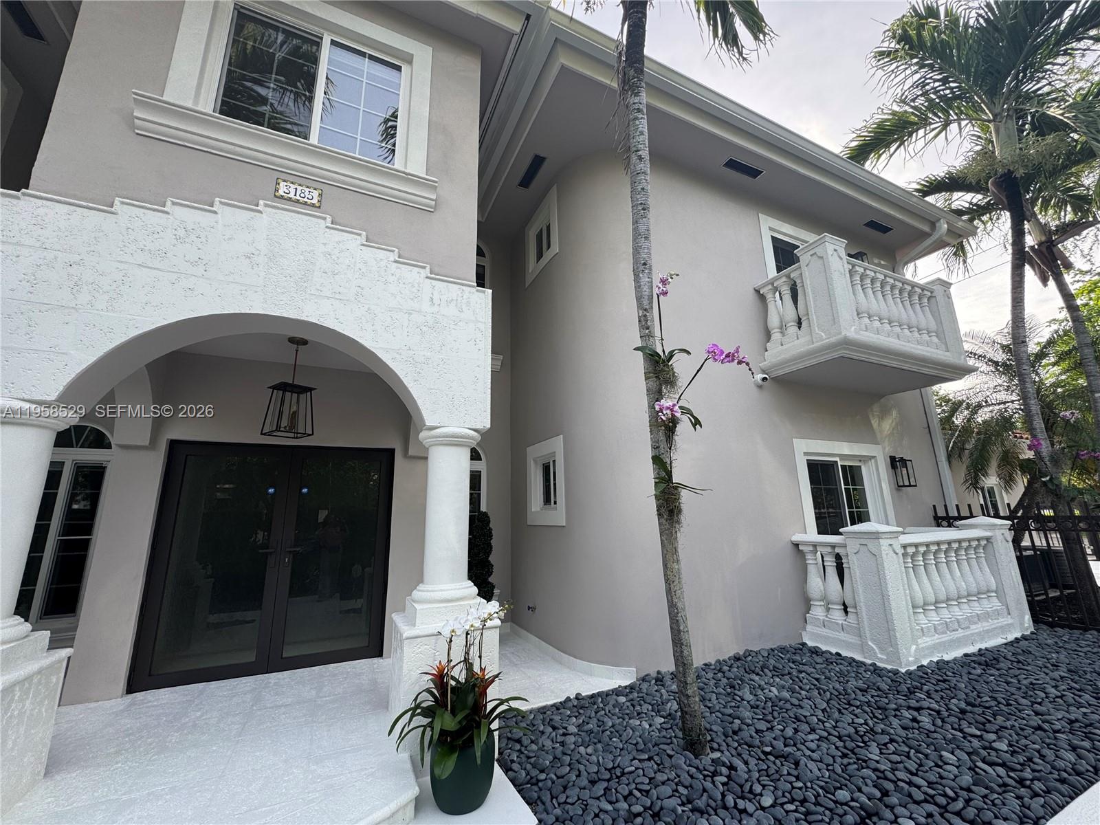 3185 Washington Street Miami, FL 33133 - Photo 35 of 48 a view of entryway with a front door