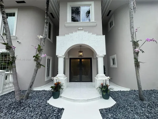 a view of a house with a white door