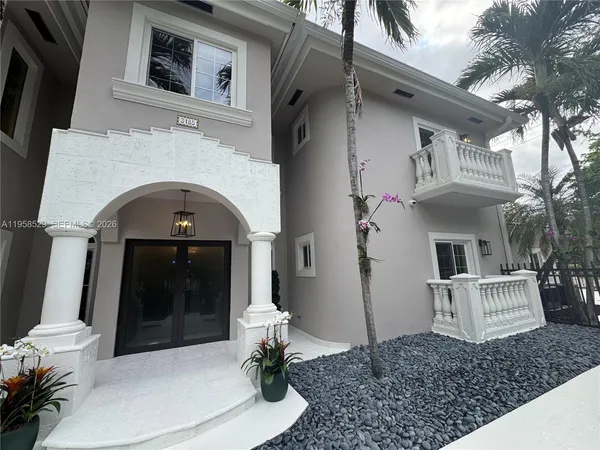 a vase of flowers sitting on a table