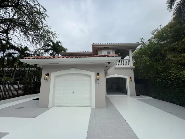 a view of a house with swimming pool