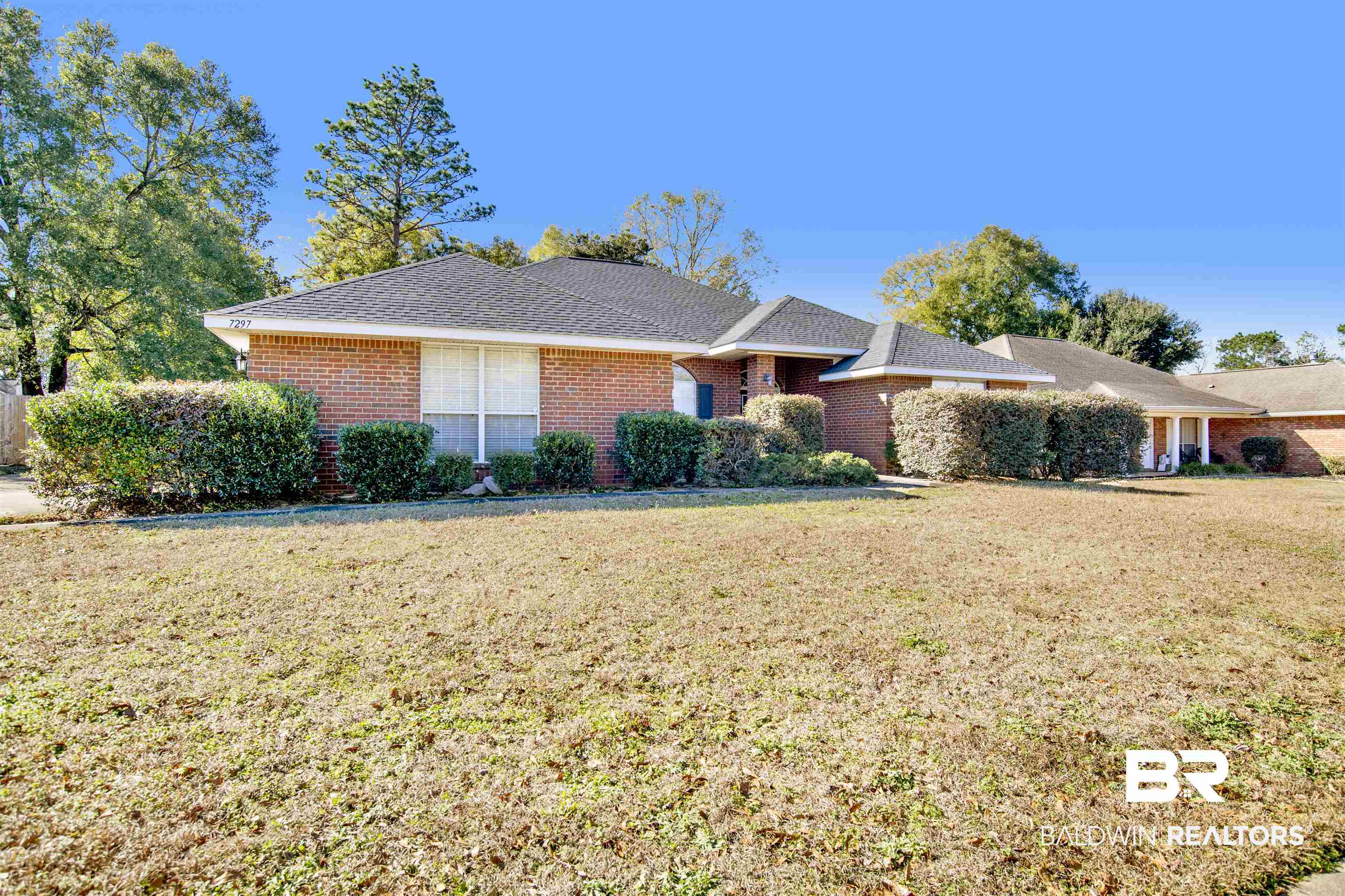 7297 Bridgemill Drive Mobile, AL 36619 - Photo 32 of 33 Ranch-style home with a front yard and brick siding