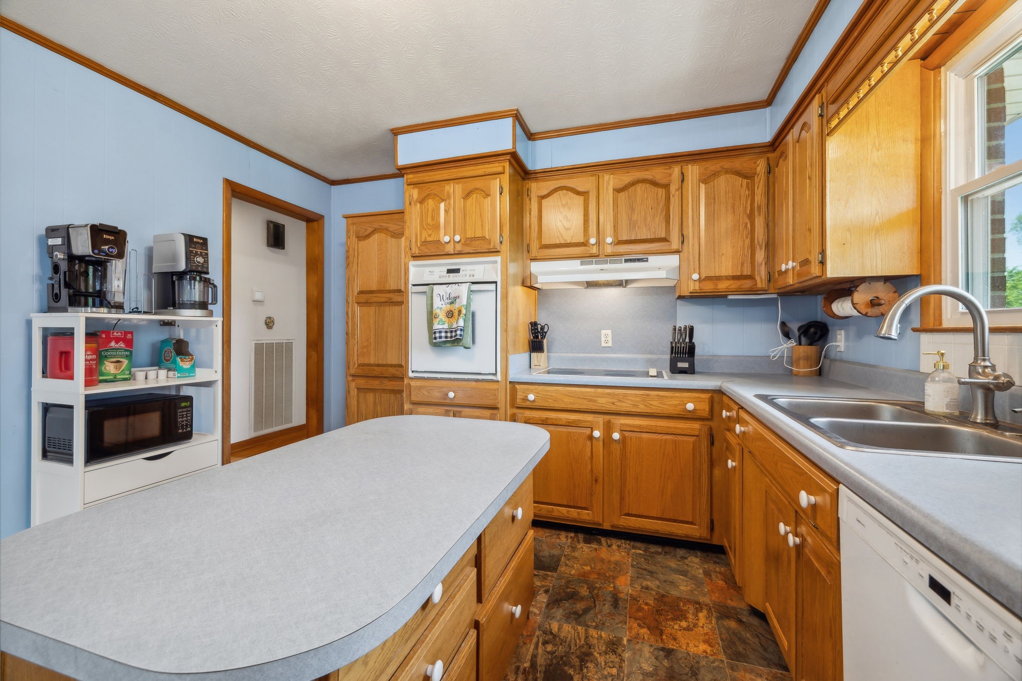 2747 Burgess Gower Road Springfield, TN 37172 - Photo 17 of 65 a kitchen with stainless steel appliances granite countertop a sink and a refrigerator