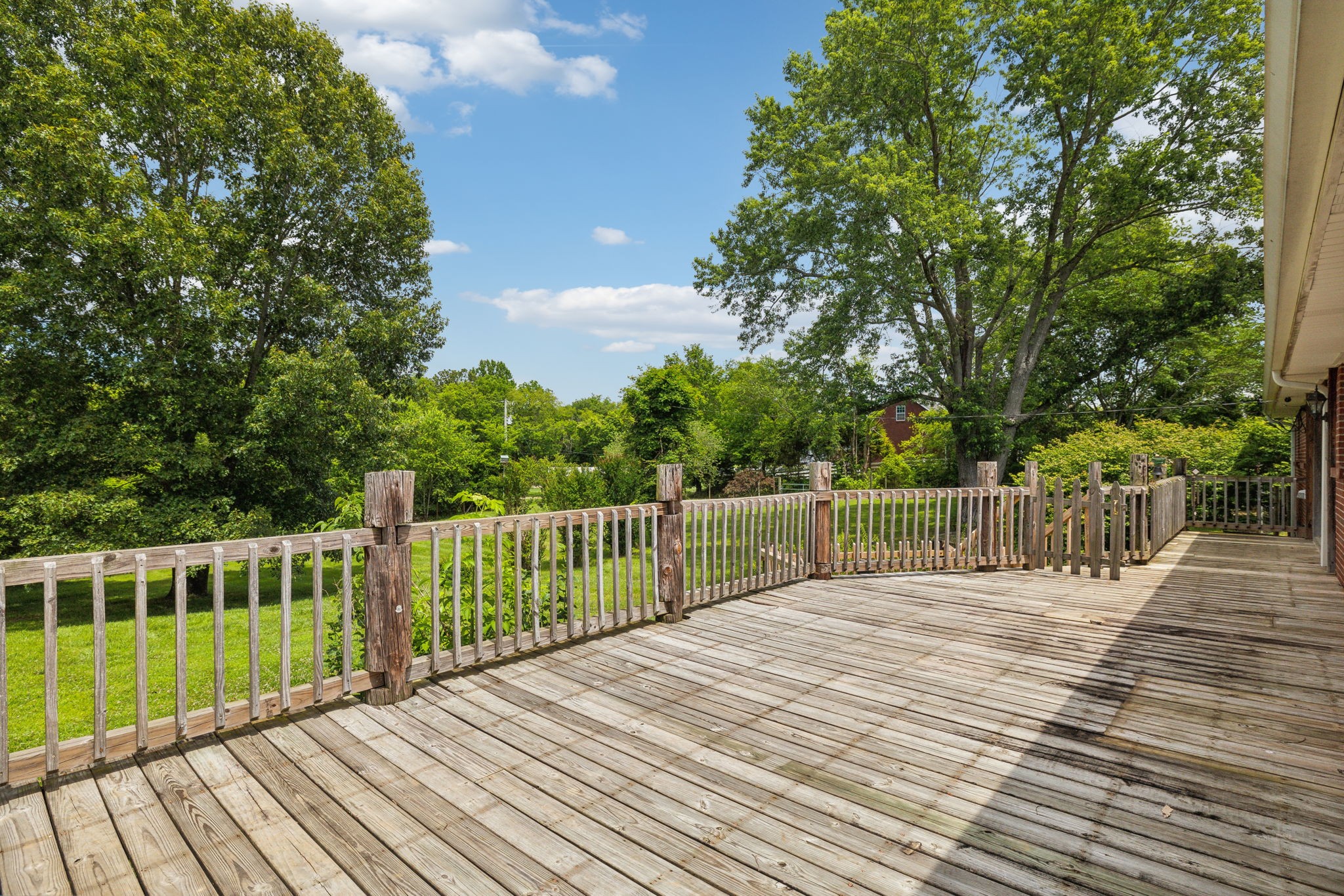 2747 Burgess Gower Road Springfield, TN 37172 - Photo 40 of 65 a view of deck with a large trees and wooden fence