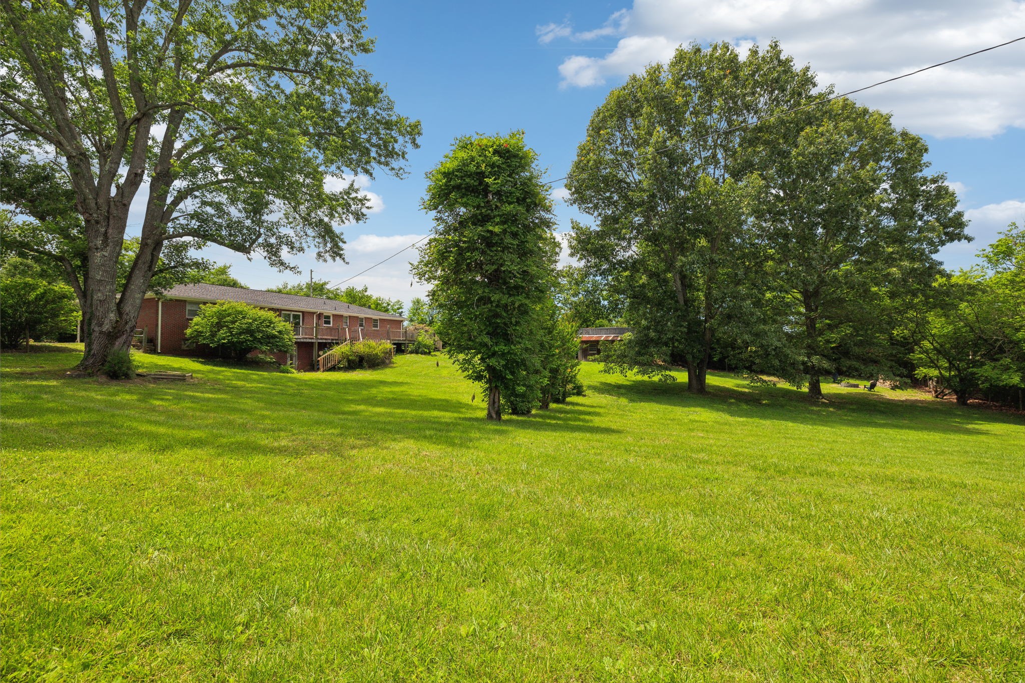 2747 Burgess Gower Road Springfield, TN 37172 - Photo 45 of 65 a view of a trees in front of a house