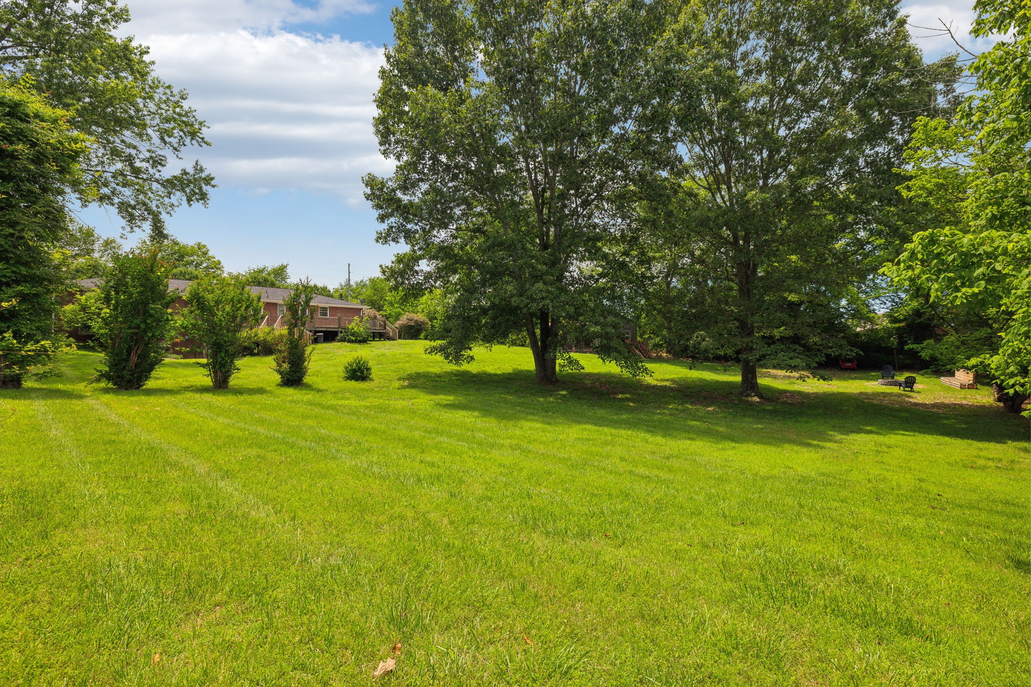 2747 Burgess Gower Road Springfield, TN 37172 - Photo 46 of 65 a view of grassy field with benches and trees all around