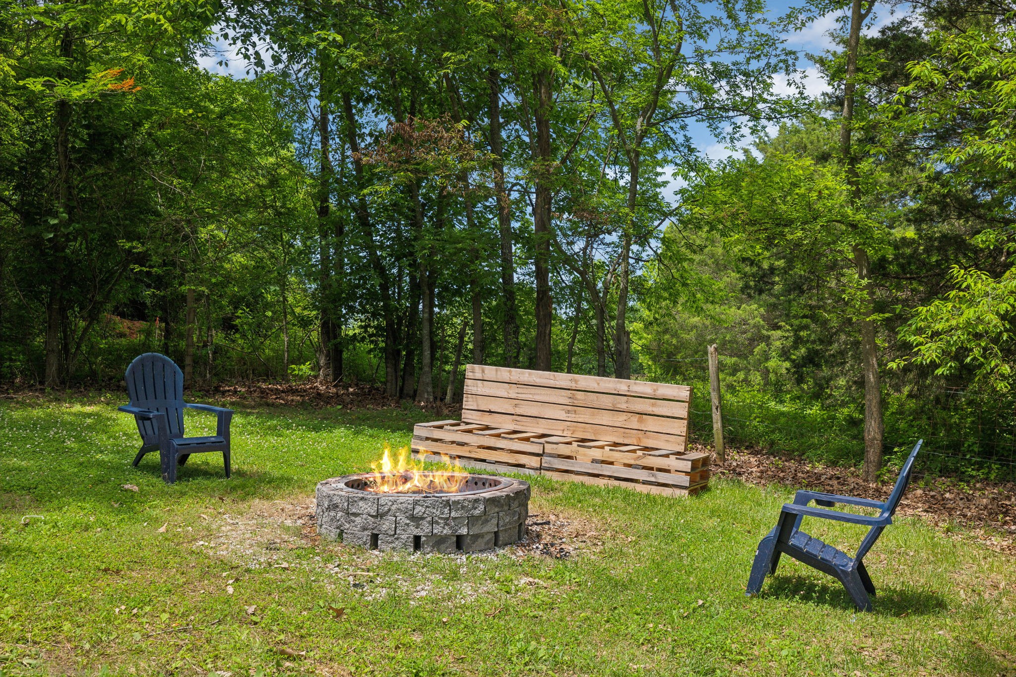 2747 Burgess Gower Road Springfield, TN 37172 - Photo 48 of 65 a view of a backyard with chairs and a bench