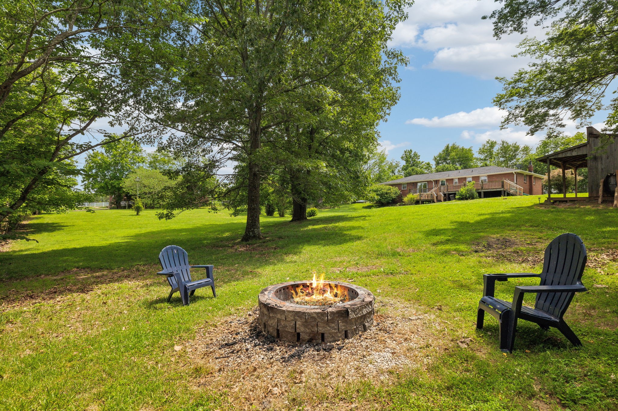 2747 Burgess Gower Road Springfield, TN 37172 - Photo 50 of 65 a swimming pool with outdoor seating and garden