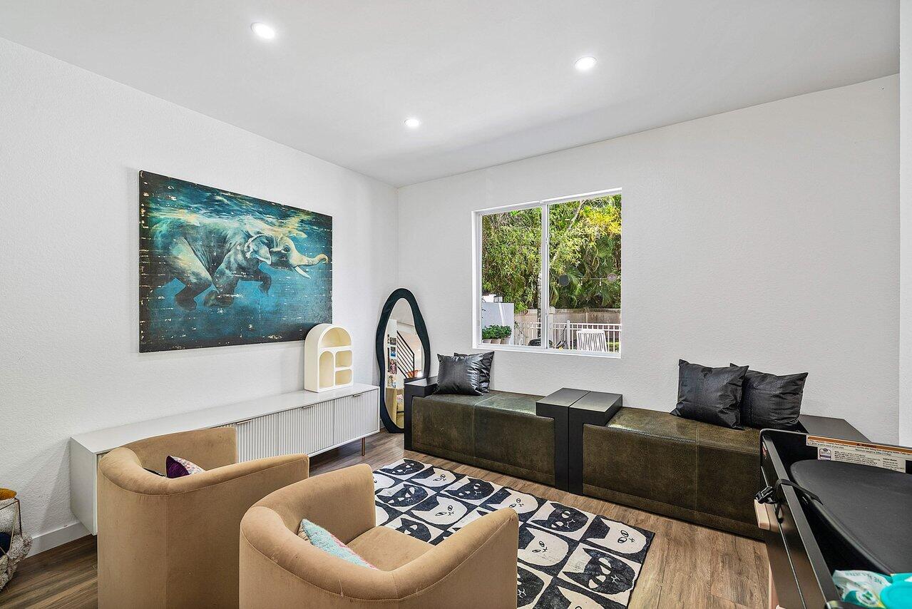 10223 Boca Vista Drive Boca Raton, FL 33498 - Photo 13 of 33 a living room with furniture and a window