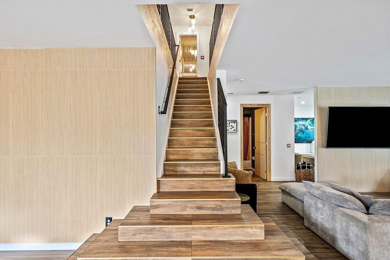 10223 Boca Vista Drive Boca Raton, FL 33498 - Photo 14 of 33 a view of entryway and hall with wooden floor