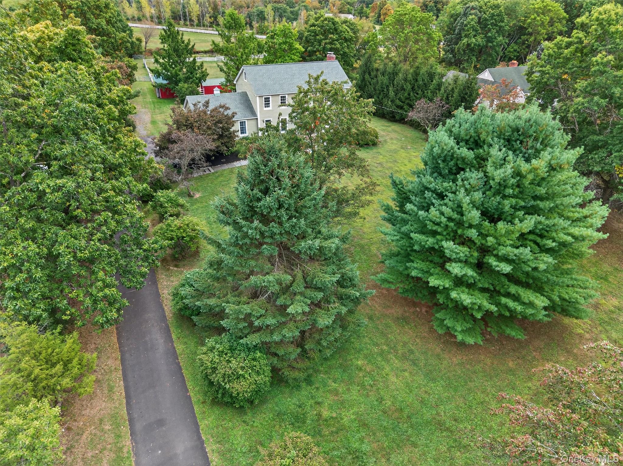 214 Dubois Road Gardiner, NY 12561 - Photo 3 of 38 an aerial view of residential house with outdoor space and trees all around