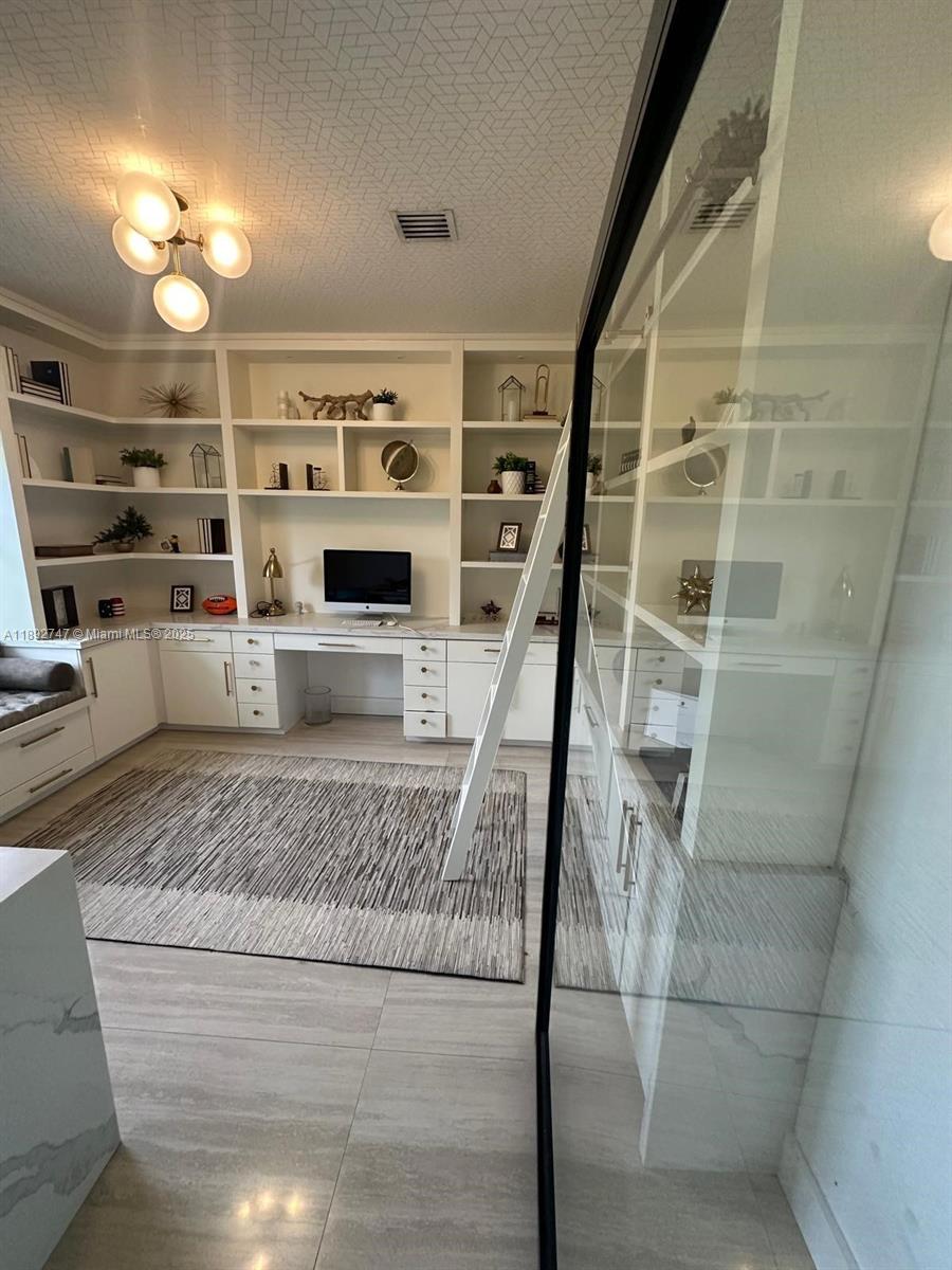 12944 Southwest 222nd Street Miami, FL 33170 - Photo 3 of 7 a view of living room with furniture and flat screen tv