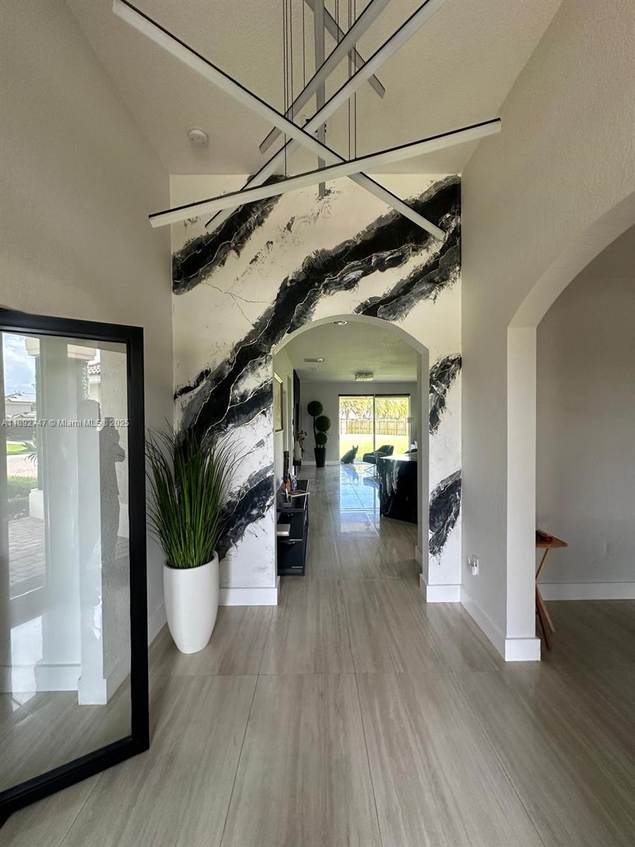 12944 Southwest 222nd Street Miami, FL 33170 - Photo 4 of 7 a view of a house with wooden floor