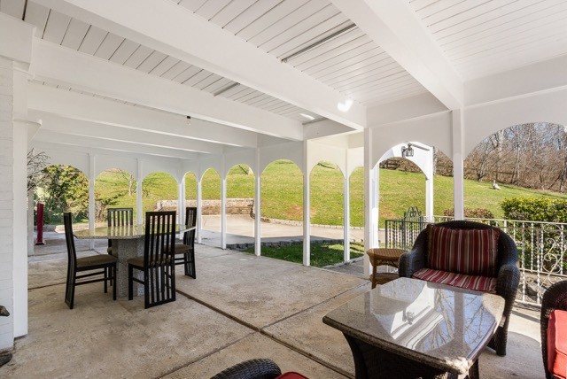 6607 Fox Hollow Road Nashville, TN 37205 - Photo 42 of 50 a view of a dining room with furniture window and outside view