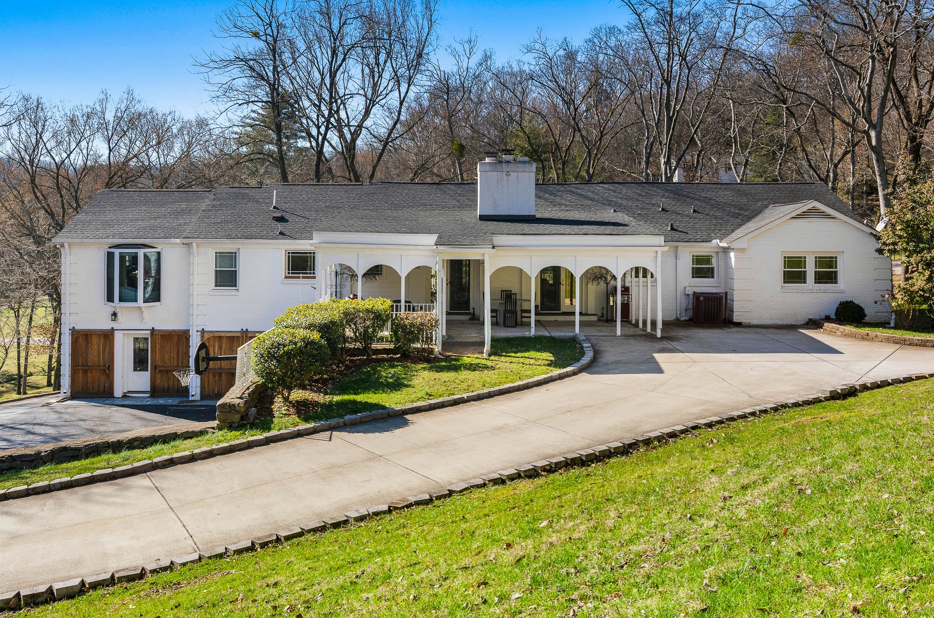 6607 Fox Hollow Road Nashville, TN 37205 - Photo 43 of 50 a view of house with yard and entertaining space