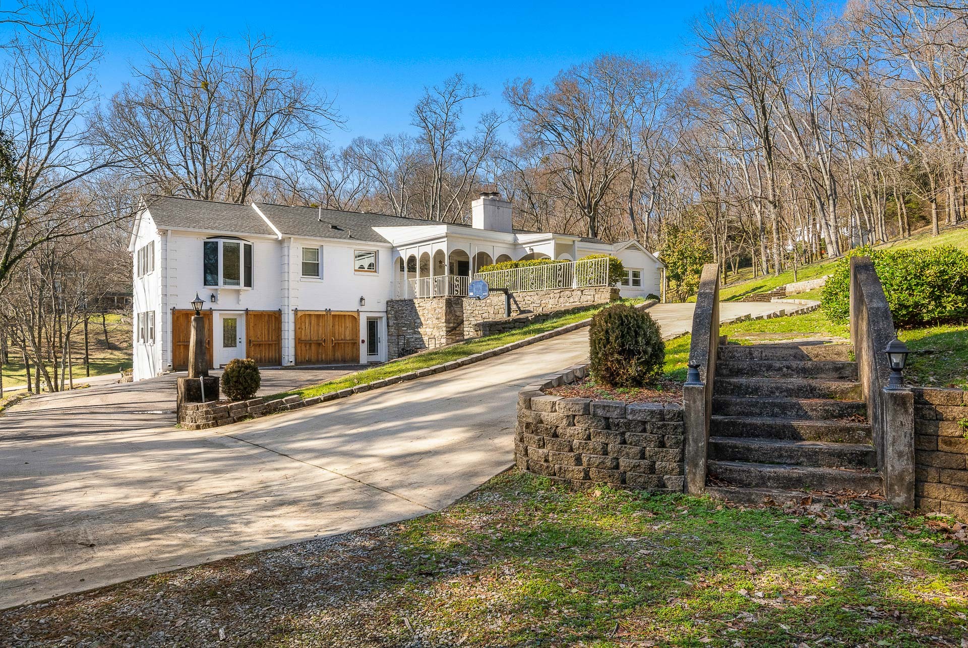6607 Fox Hollow Road Nashville, TN 37205 - Photo 44 of 50 a view of a house with a yard