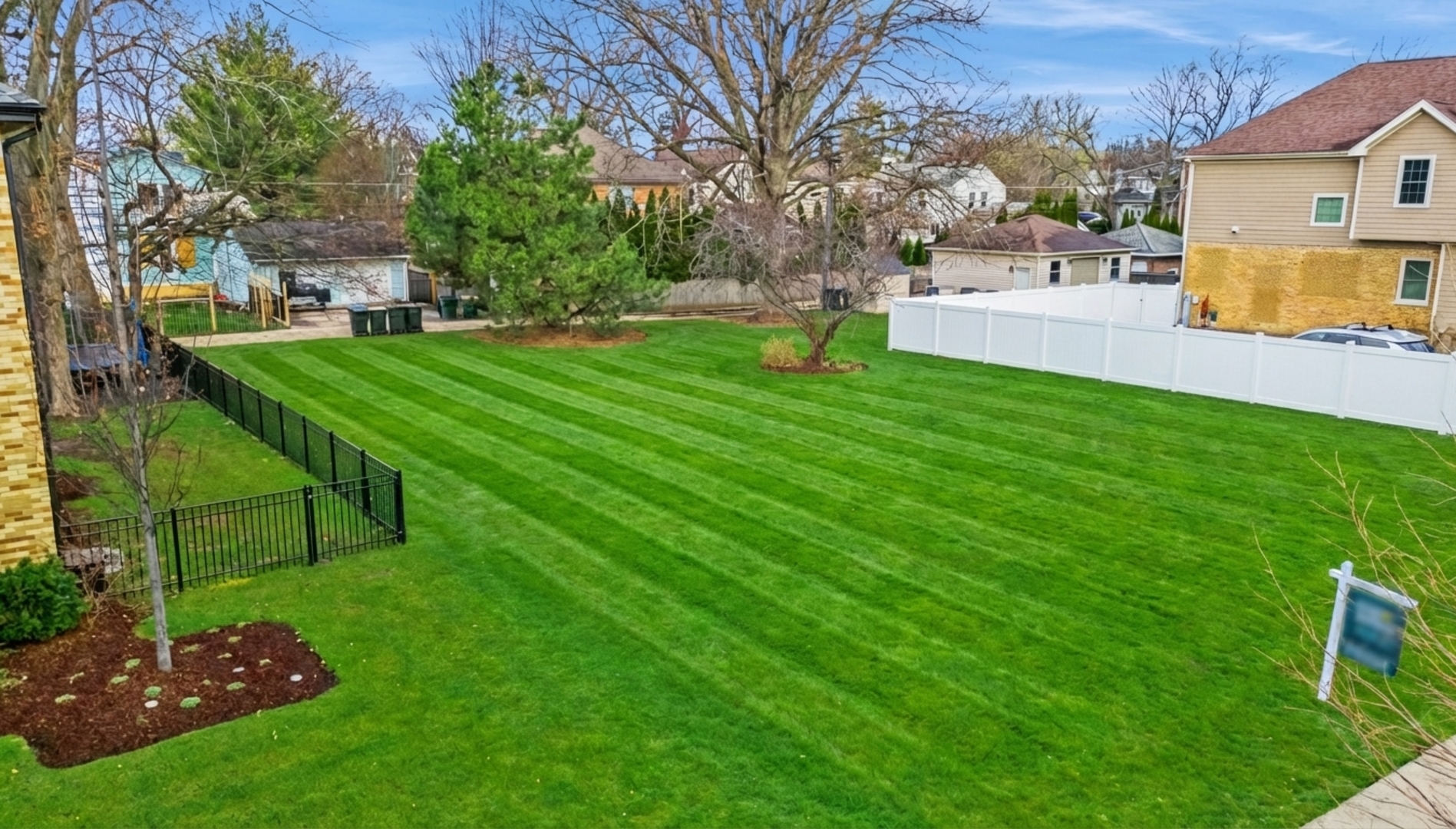 a view of a backyard with a garden