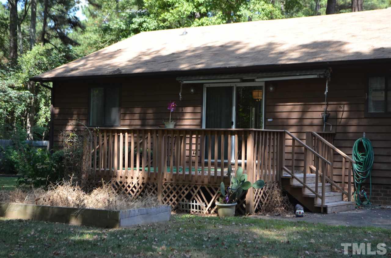 817 Horton Road Durham, NC 27704 - Photo 18 of 21 a view of house with yard and outdoor seating