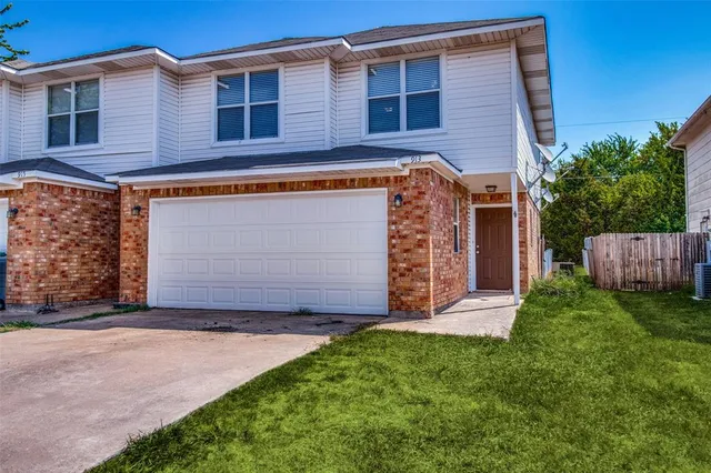 a front view of house with yard