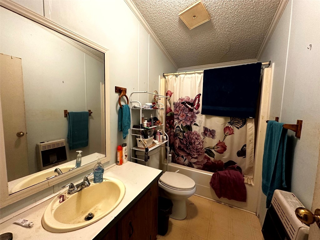 119 Cedar Frst Lane Corrigan, TX 75939 - Photo 18 of 32 a bathroom with a sink toilet and mirror