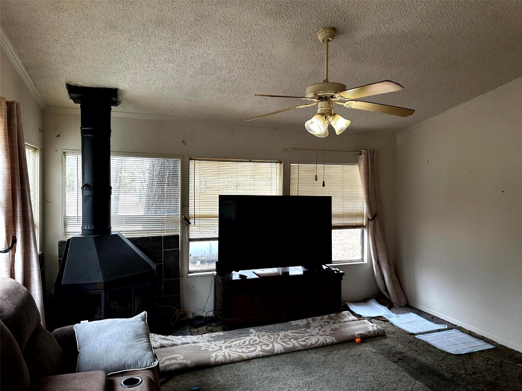119 Cedar Frst Lane Corrigan, TX 75939 - Photo 4 of 32 a living room with furniture and a flat screen tv
